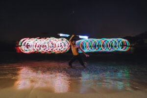 fire crew spinning cayman islands beach portrait long exposure photography