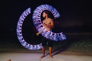 fire crew spinning cayman islands beach portrait long exposure photography