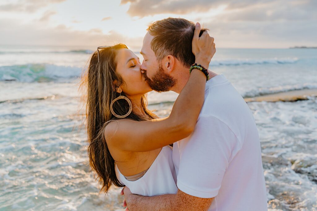 auckland couple engagement photographer beach sunset