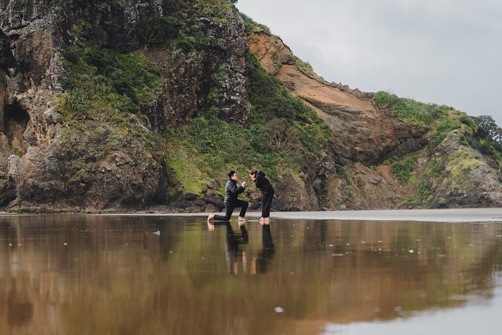 piha beach surprise proposal engagement photographer