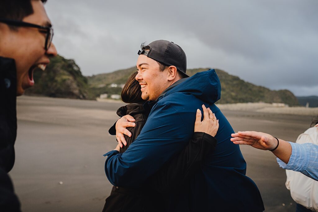 piha beach surprise proposal engagement photographer